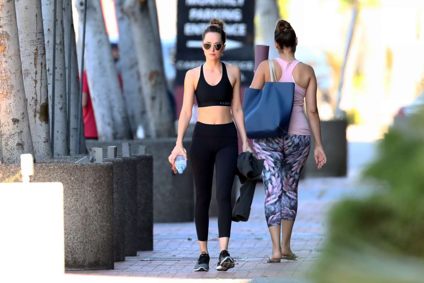 Dakota Johnson in Tights and Sports Bra â€“ Outside a gym in Los Angeles