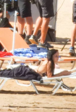 Dakota Johnson - On a movie set on a beach in Spetses - Greece