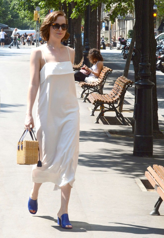 Dakota Johnson in White Dress Out in Barcelona