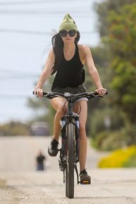 Dakota Jonhson and Chris Martin - Out for a bike ride in Malibu