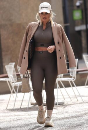 Danielle Armstrong - Shows her abs while out for business meetings in London
