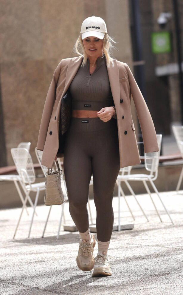 Danielle Armstrong - Shows her abs while out for business meetings in London