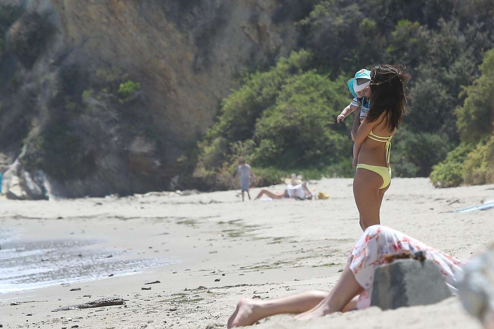 Danielle Campbell in Yellow Bikini at a Beach in Malibu. 