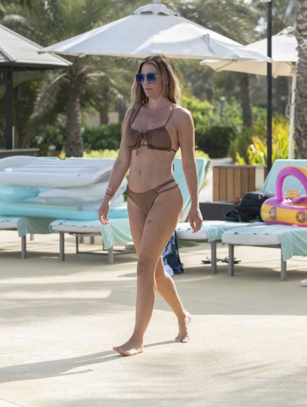 Danielle Lloyd - Seen in a brown bikini at her hotel pool in Dubai