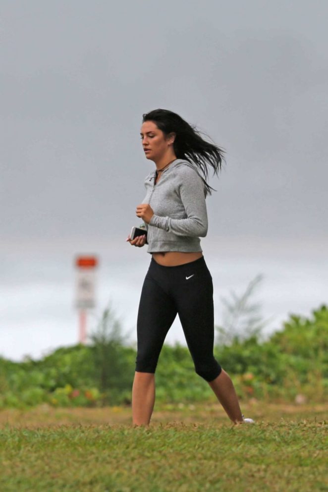 Darcie Lincoln in Tights Jogging on the Beach in Hawaii