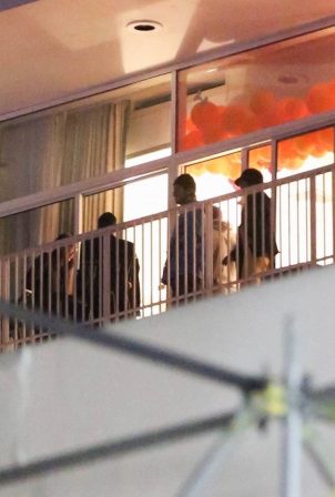 Demi Lovato - Hangs out with a friends on a balcony in Beverly Hills