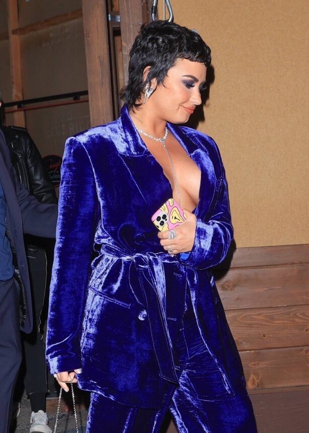 Demi Lovato - Seen in a blue dress leaving Craig’s in West Hollywood