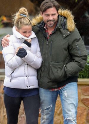 Denise Richards and Aaron Phypers - Out on a rainy day in Malibu