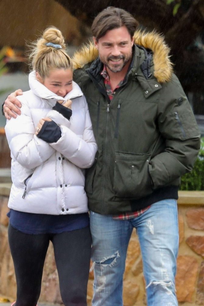 Denise Richards and Aaron Phypers - Out on a rainy day in Malibu