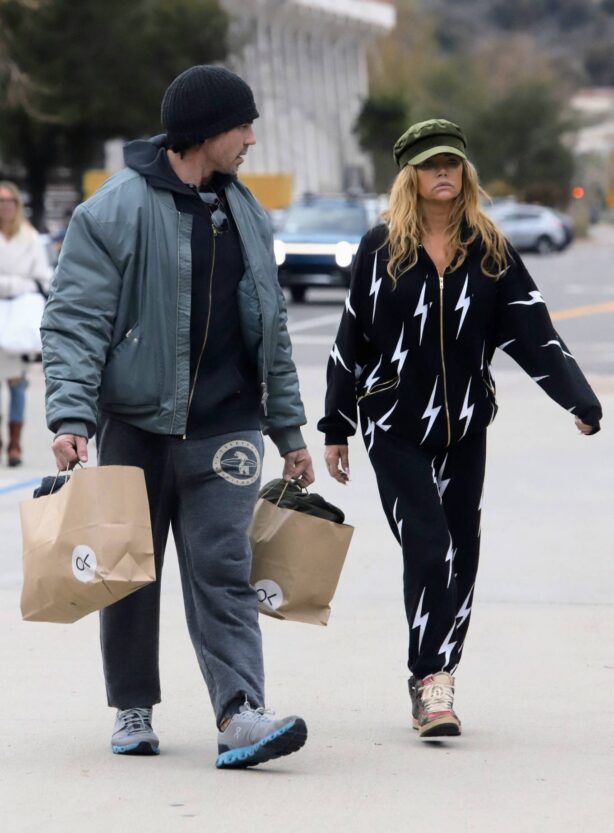 Denise Richards - Shopping in onesie with husband Aaron Phypers in Malibu