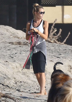 Denise Richards with her dogs on Malibu Beach