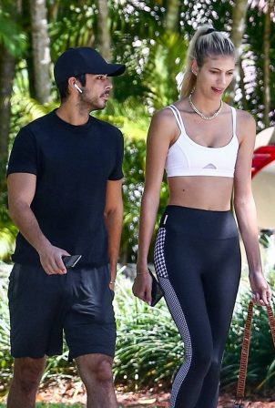 Devon Windsor - Jogging with her husband and dog in Miami