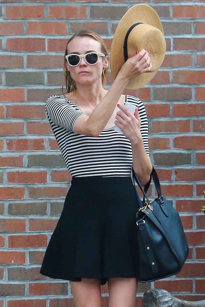 Diane Kruger in Mini Skirt Leaving her hotel in NYC