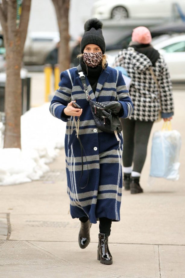 Dianna Agron - In a navy striped coat and pom pom hat out in New York