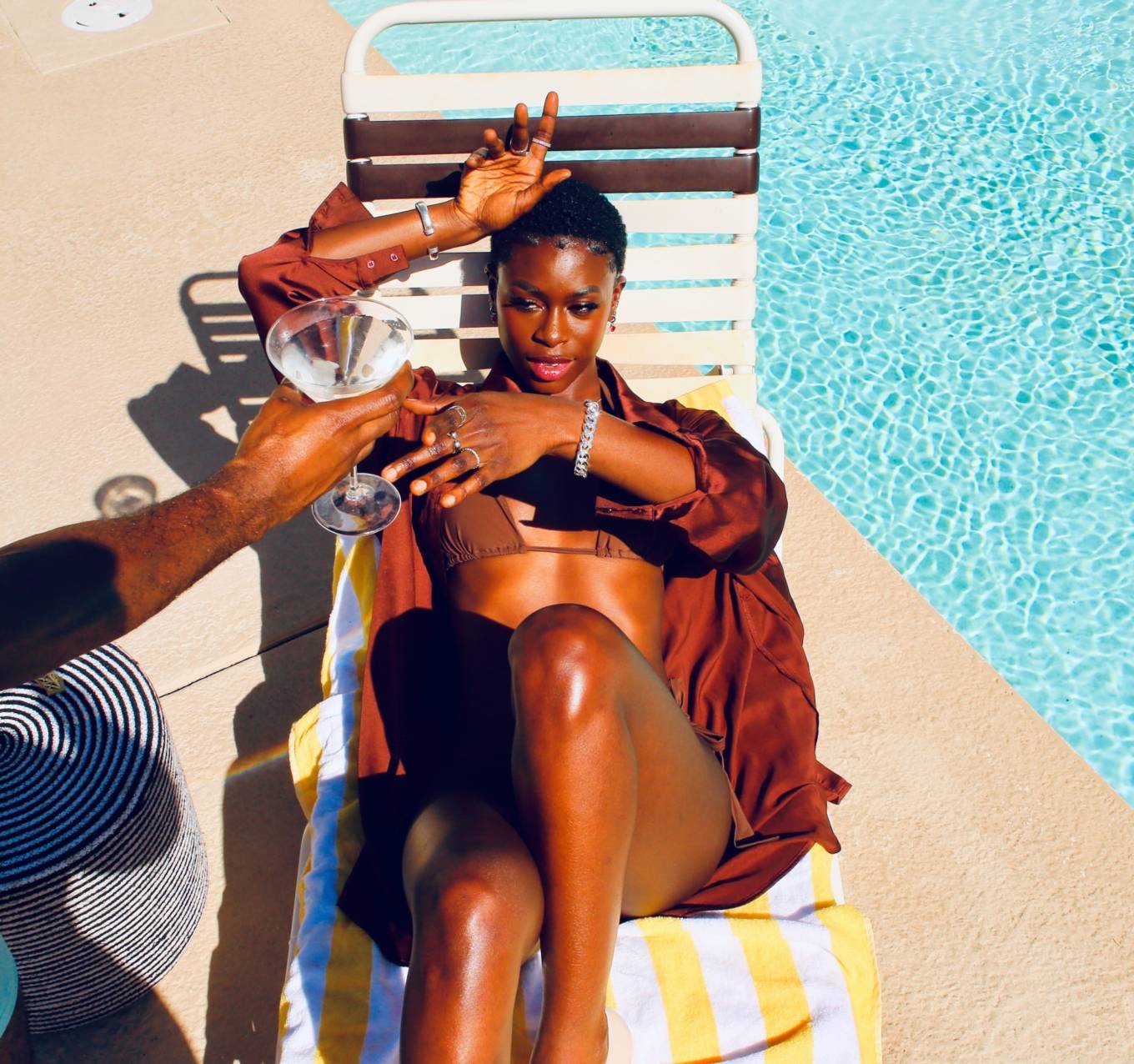 Diarra Sylla - In a bikini by the pool in Palm Springs. 