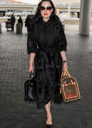 Dita Von Teese in black velvet at LAX Airport in LA