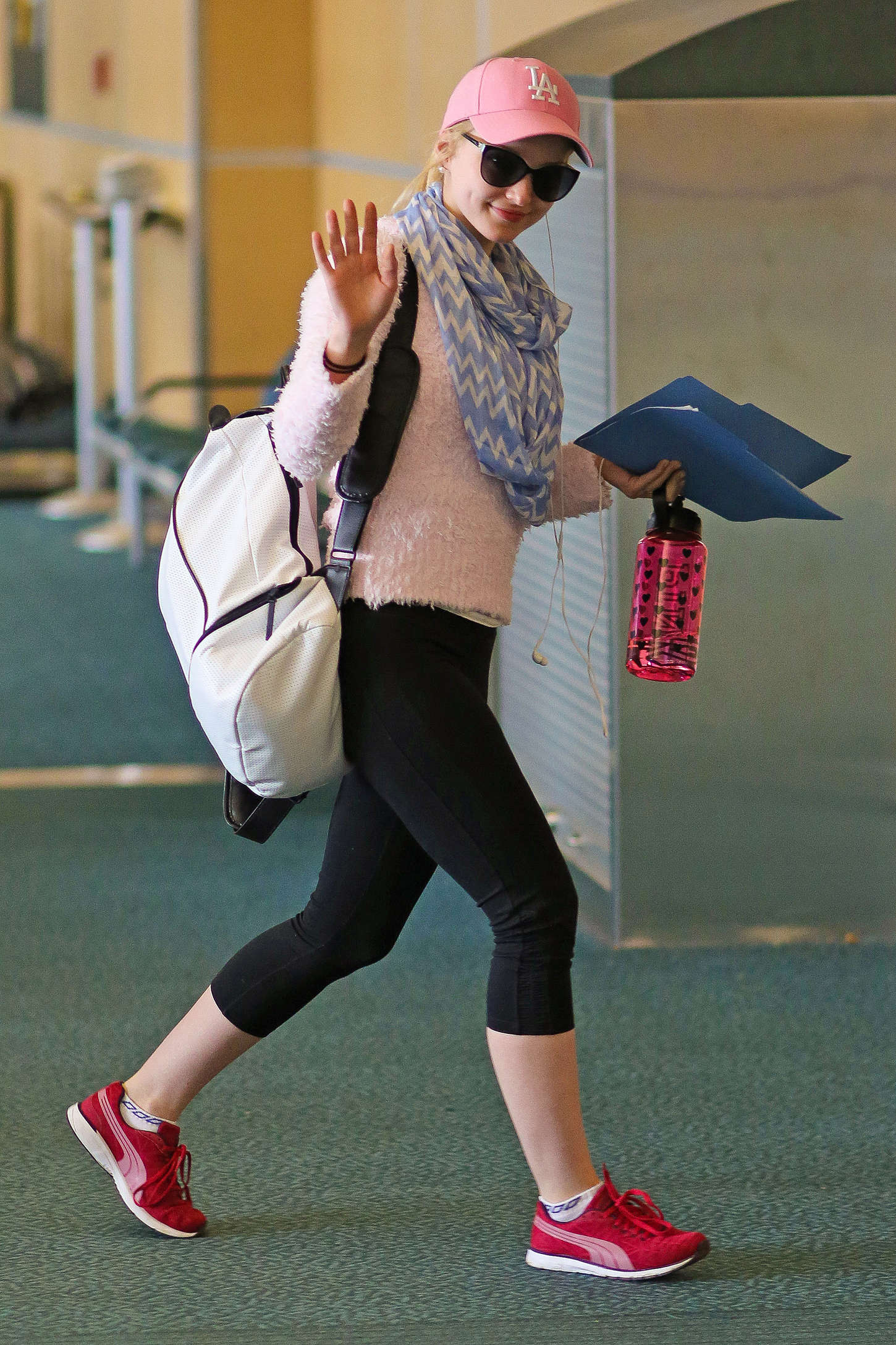 Dove Cameron at Airport in Vancouver. 