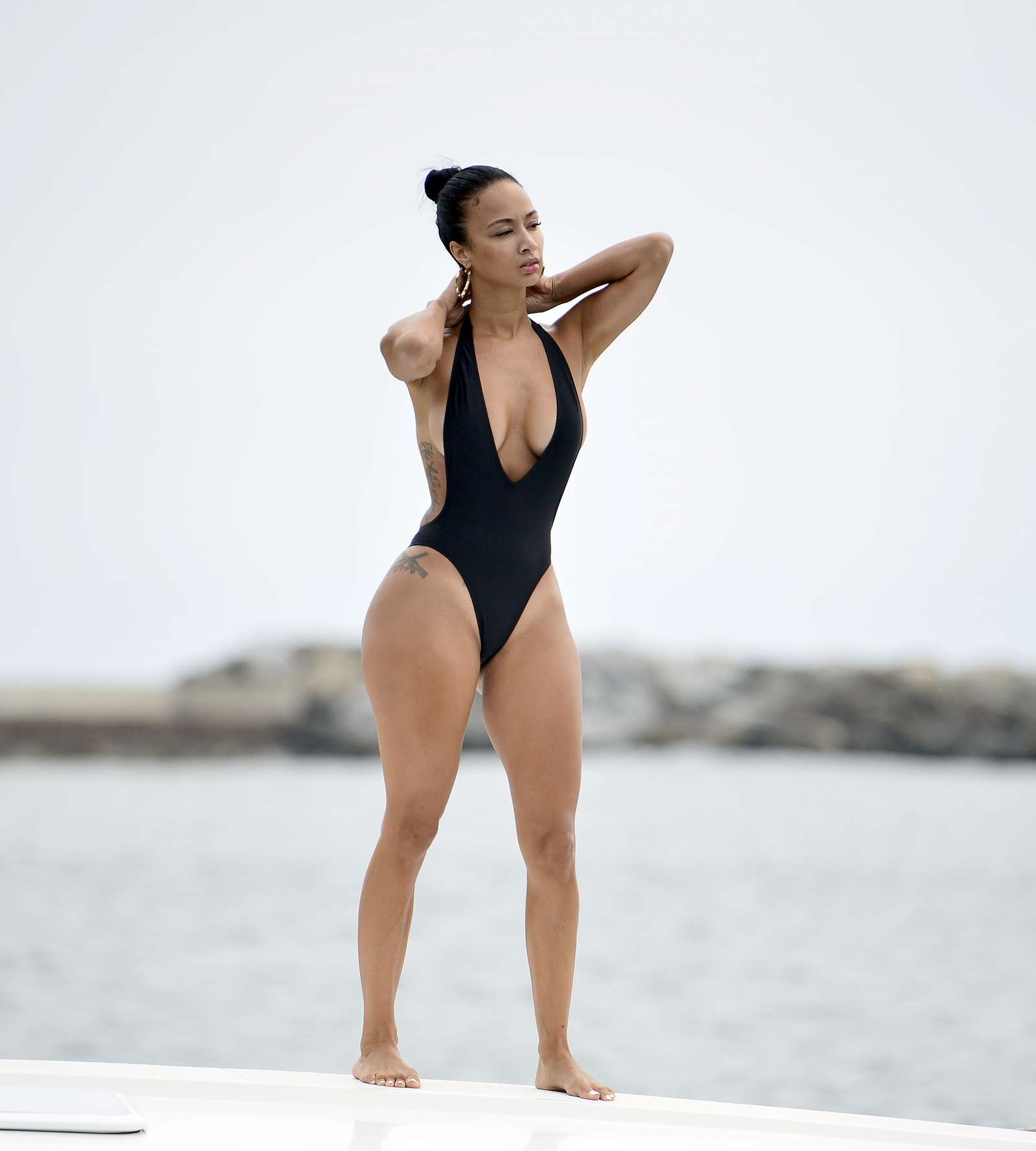 Draya Michele in Black Swimsuiti in Newport Beach. 