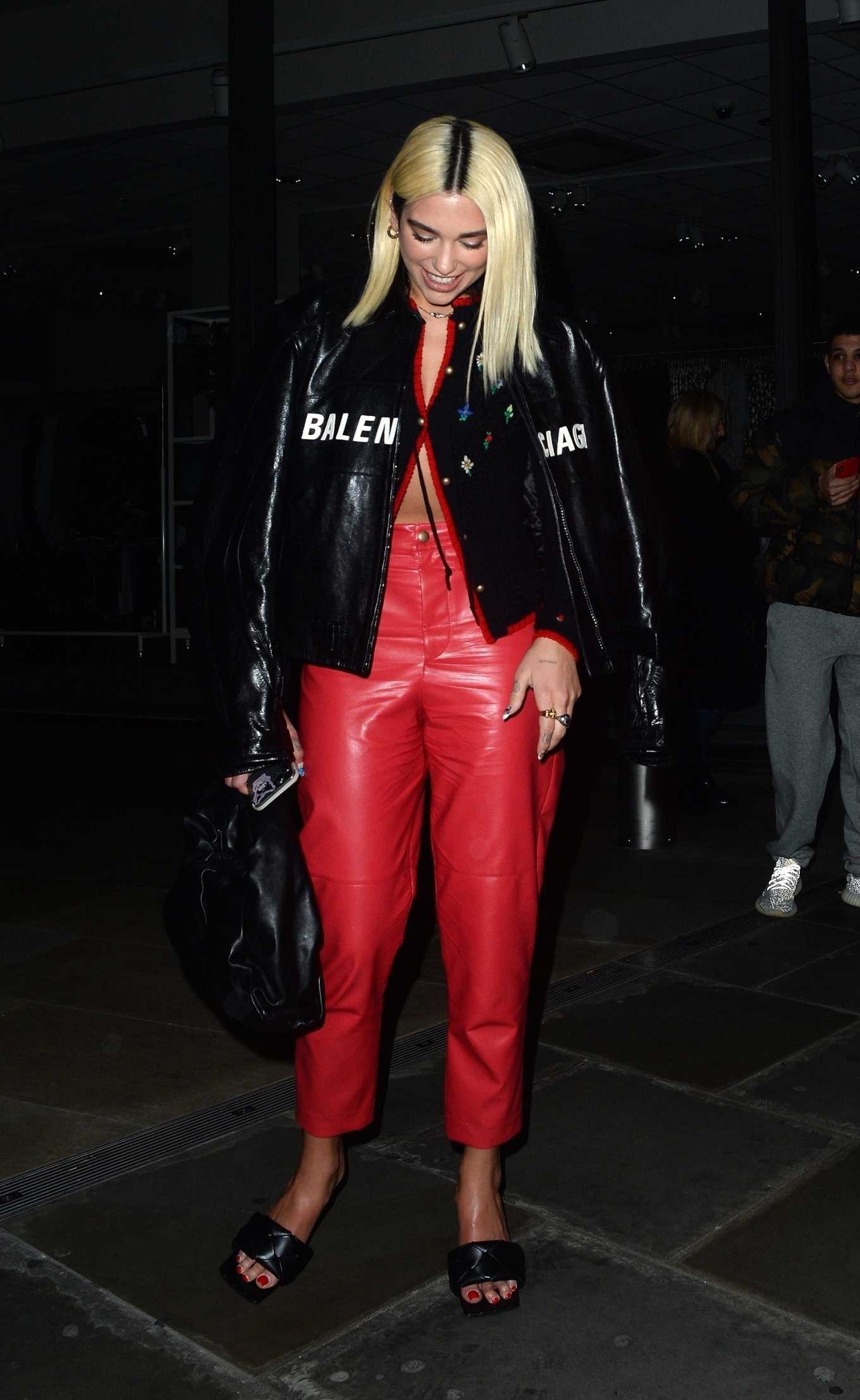 Dua Lipa in Red Pants at The Ivy Asia in London
