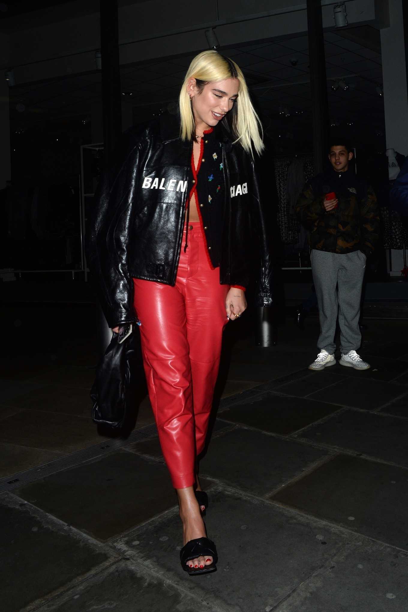 Dua Lipa in Red Pants at The Ivy Asia in London