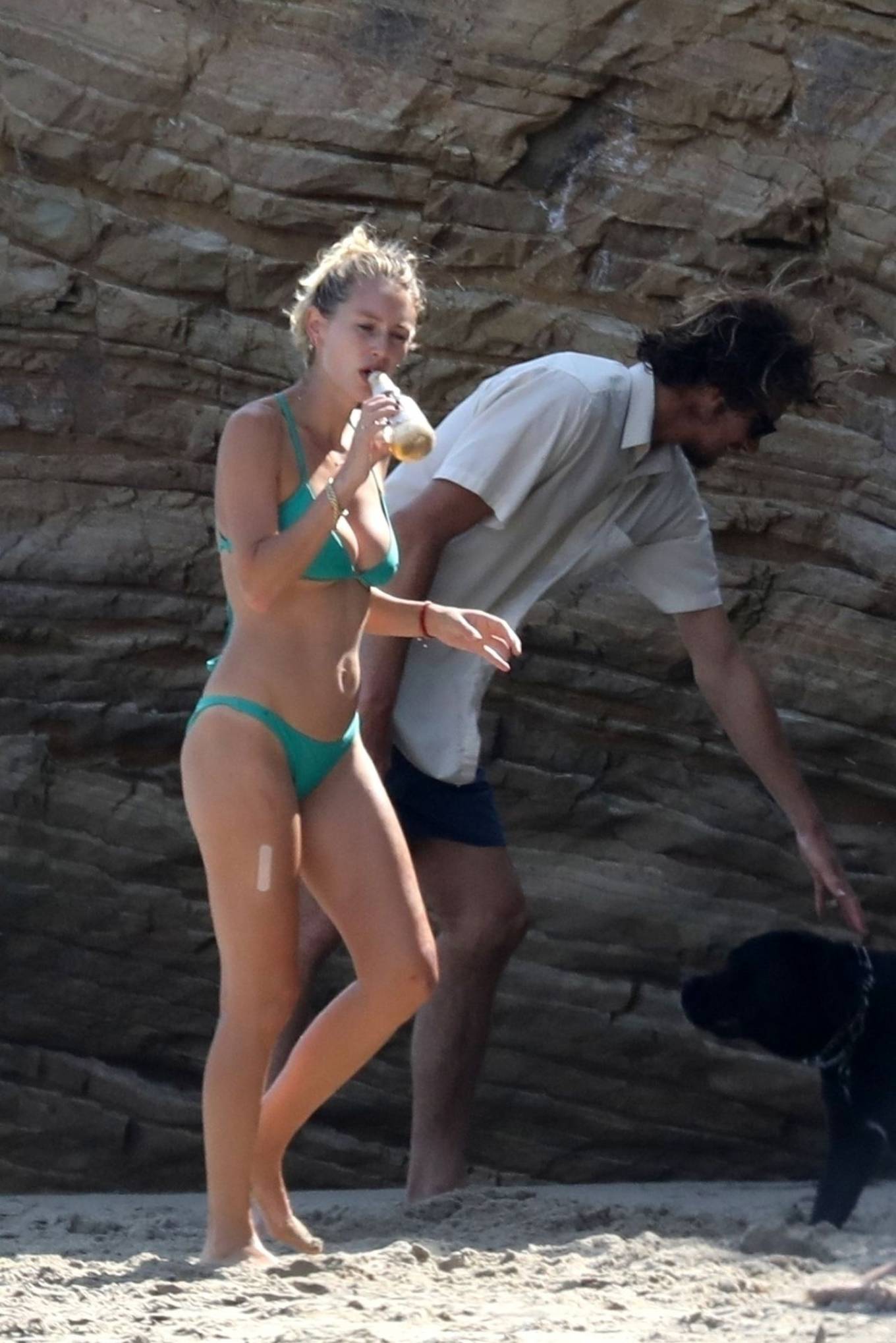 Dylan Penn in Green Bikini at a beach in Malibu