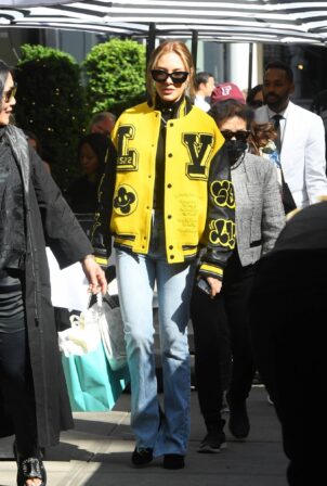 Eileen Gu - In a yellow Louis Vuitton college jacket shopping at Tiffany's in New York
