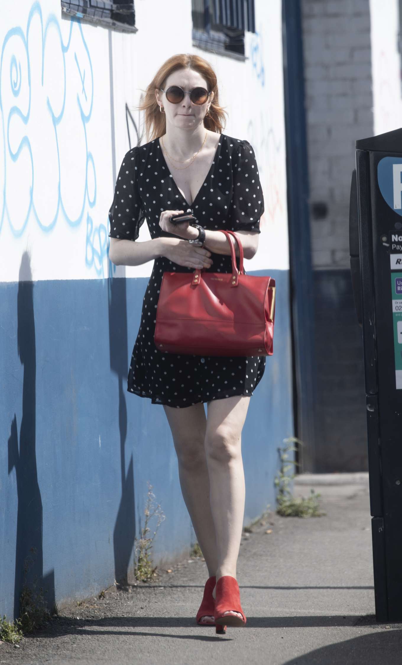 Eleanor Tomlinson in Polka Dot Mini Dress â€“ Out in London