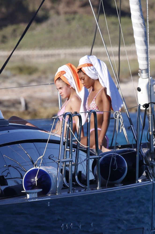 Elena Carriere and Anuthyda Ploypech in Bikini on a boat in Formentera