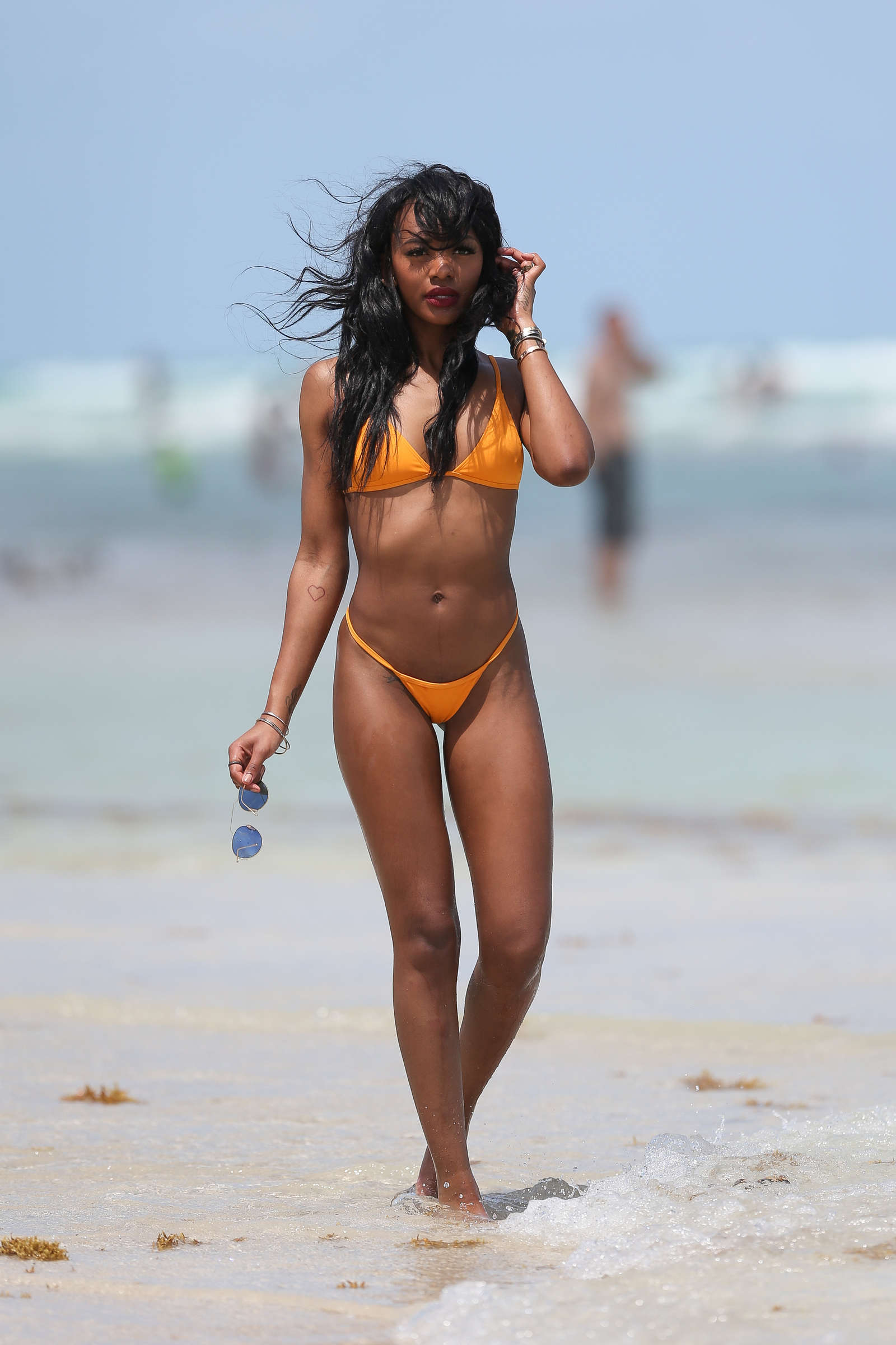 Elisa Johnson in Orange Bikini in Miami. 