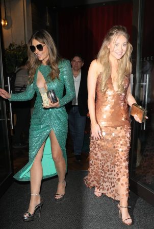 Elizabeth Hurley - Exits Strictly Confidential with co star Georgia Lock in London