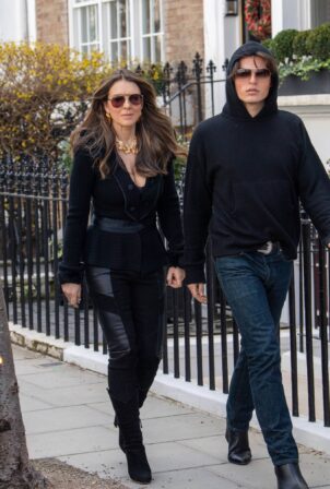 Elizabeth Hurley - On the set of 'Christmas In The Caribbean' with Nathalie Cox in London