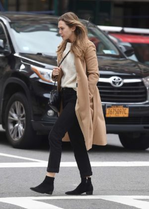 Elizabeth Olsen in a beige coat out in New York City