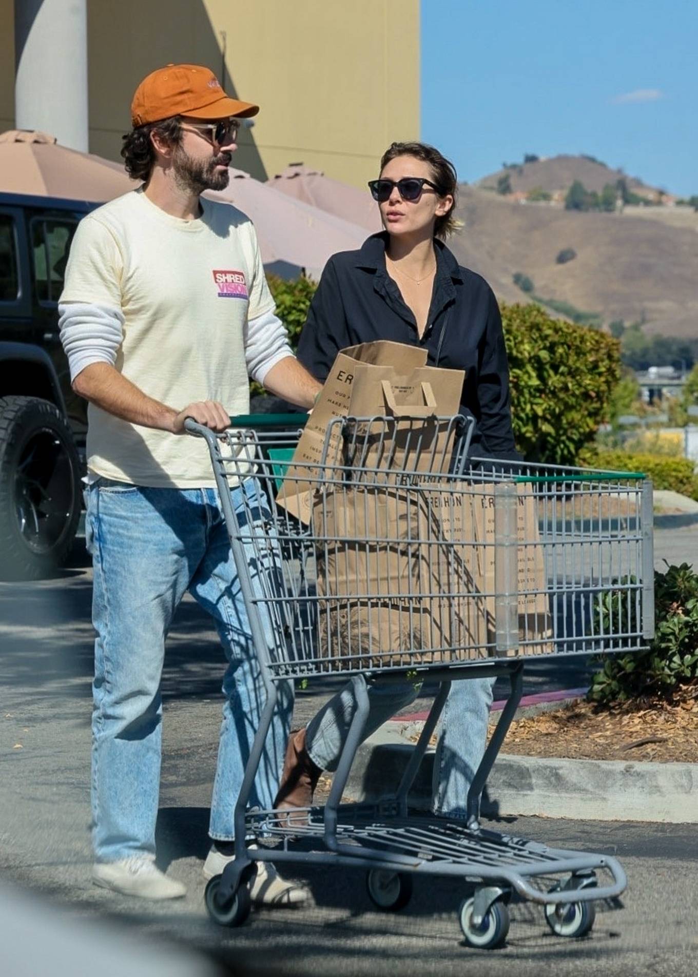 Elizabeth Olsen 2022 : Elizabeth Olsen – With her husband Robbie Arnett seen at Erewhon Market in LA-08