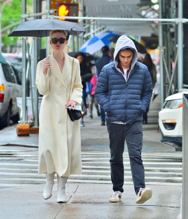 Elle Fanning and Max Minghella on a rainy day in NYC