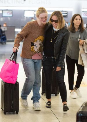 Elle Fanning and Olivia Wilde - Arrive at JFK Airport in NYC