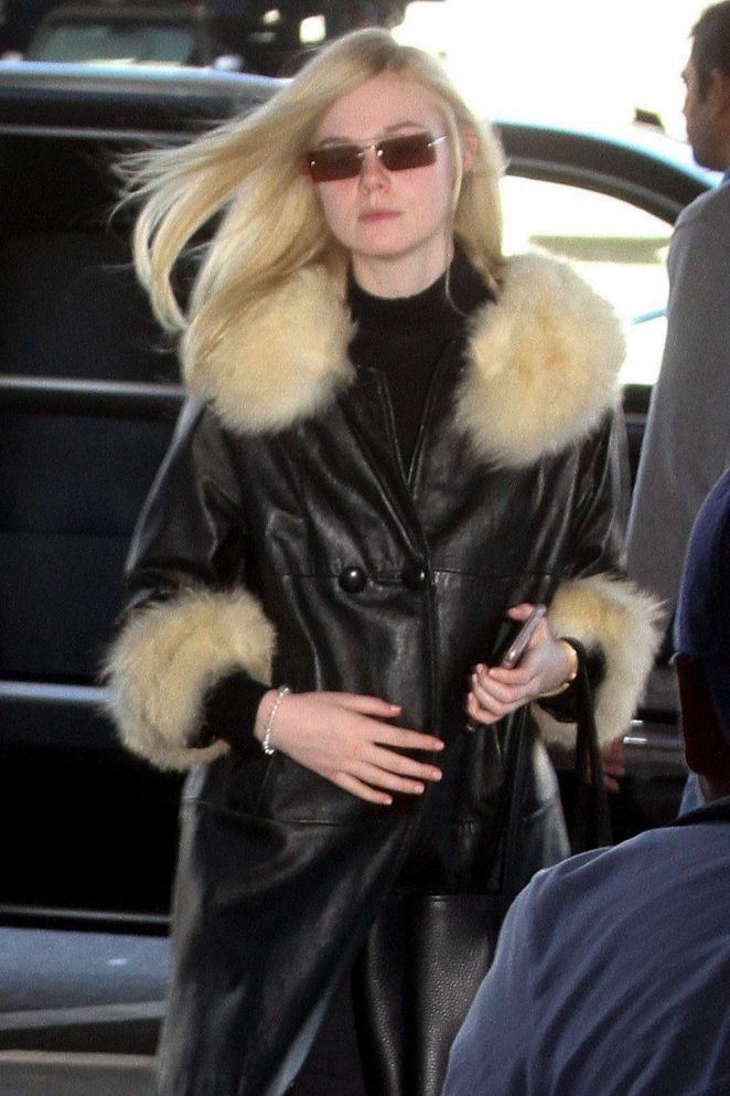 Elle Fanning - Arrives at LAX airport in Los Angeles