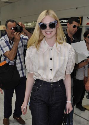 Elle Fanning Arriving at Airport in Nice