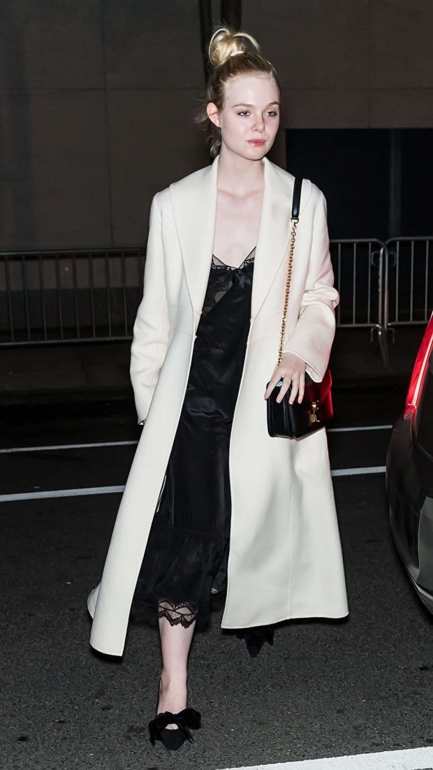 Elle Fanning - Arriving at her hotel in NYC
