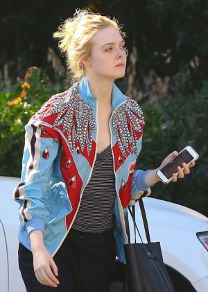 Elle Fanning in a bold jacket for a visit to the studio in Burbank