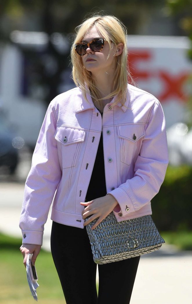 Elle Fanning in a pink jacket out in LA