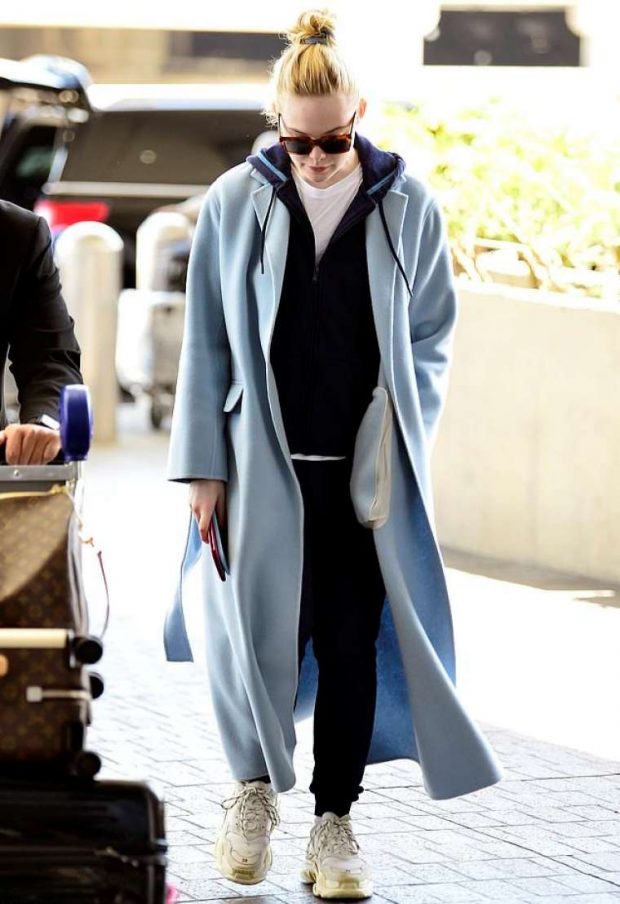 Elle Fanning in Long Coat - Arriving at LAX Airport in LA