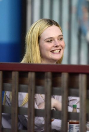 Elle Fanning - Is having a great time with her friends in Los Angeles