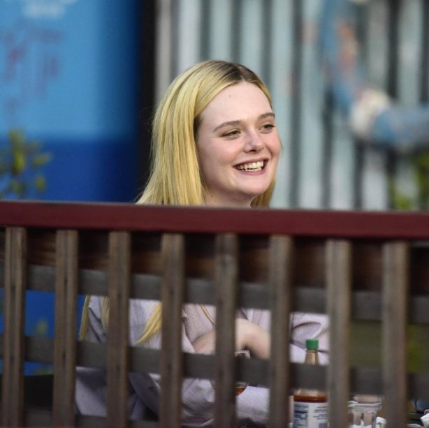 Elle Fanning - Is having a great time with her friends in Los Angeles