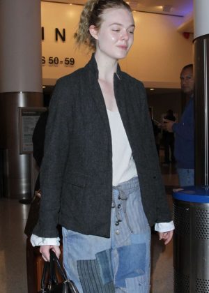 Elle Fanning - Leaving LAX Airport in Los Angeles