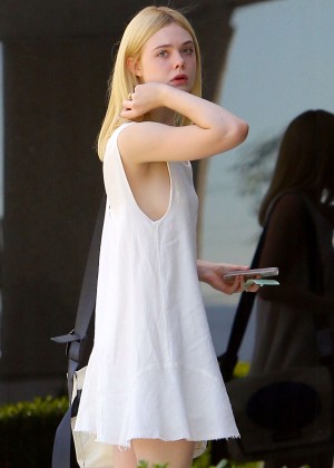 Elle Fanning in White Mini Dress out in Hollywood