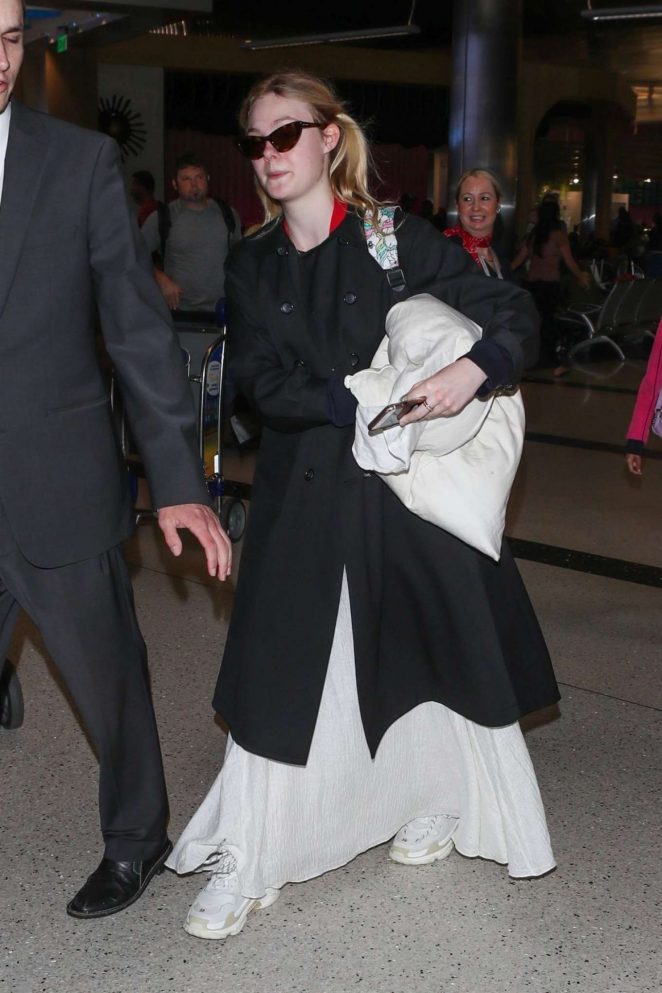 Elle Fanning - Seen at Lax Airport In Los Angeles