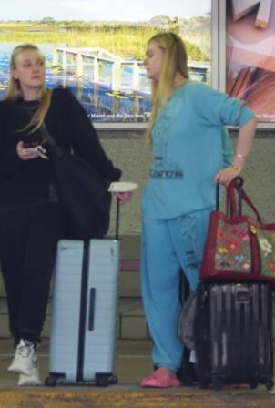 Elle Fanning - With Dakota Touch down in Miami
