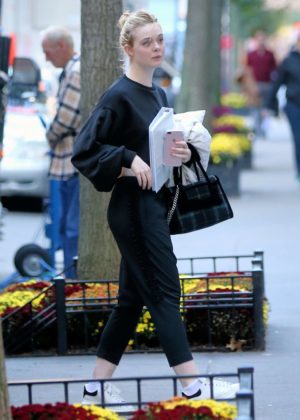 Elle Fanning with her favorite pillow out in NYC