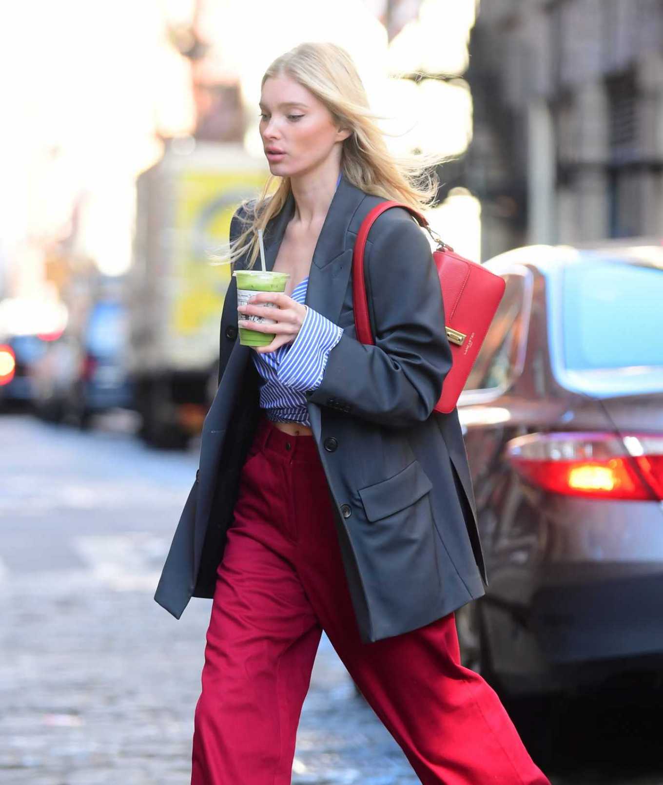 Elsa Hosk – In red oversized pants out in New York City | GotCeleb