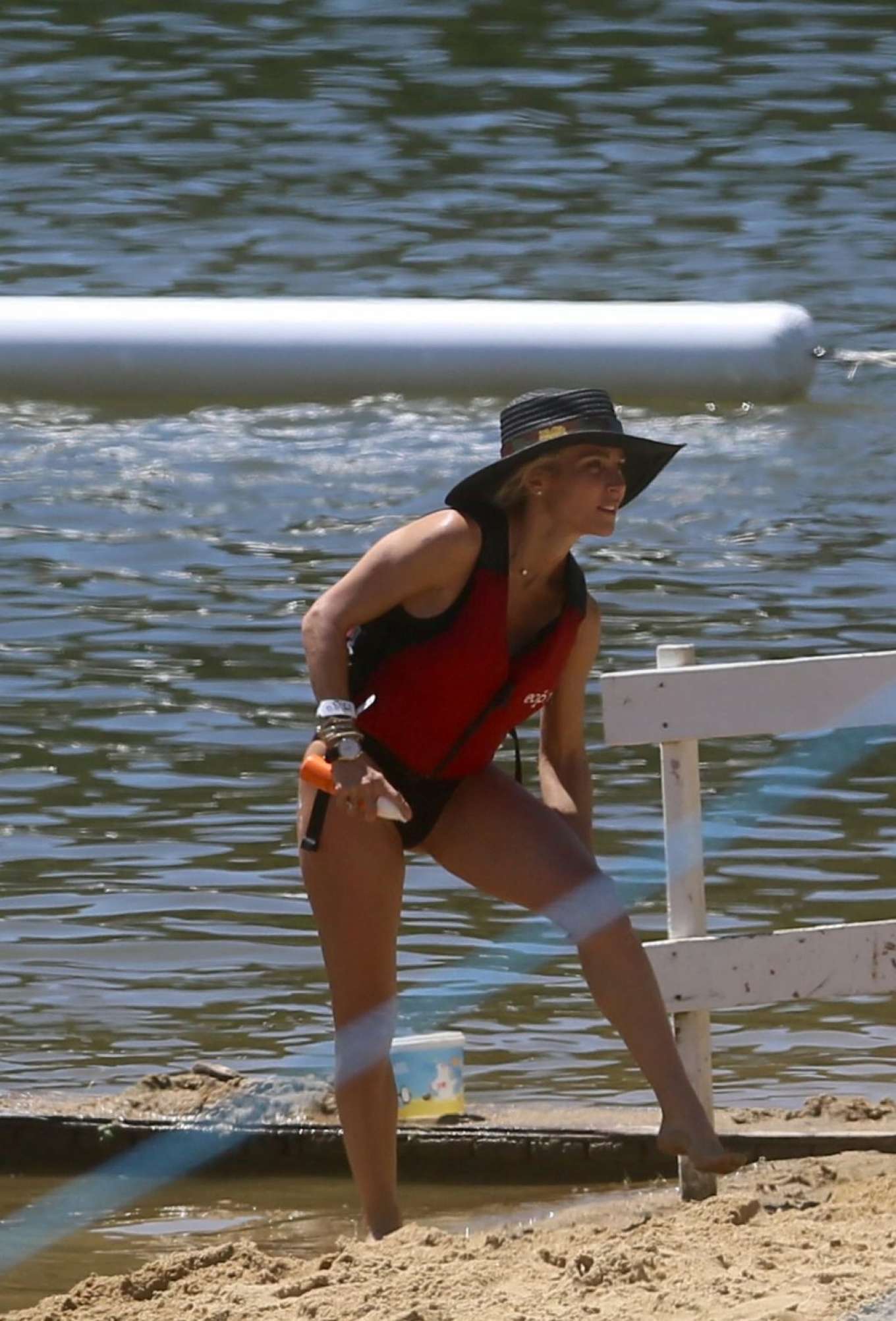 Elsa Pataky in Black Swimsuit in the Senpere Lake in France